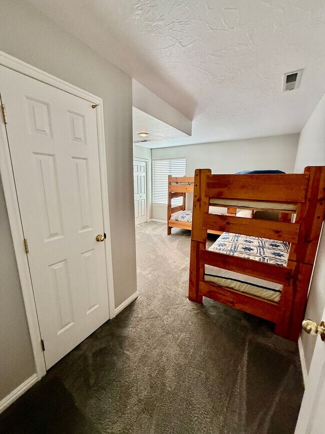 Building Photo - Furnished and Utilities Included: Two-Bedroom Basement Apartment with Private Yard