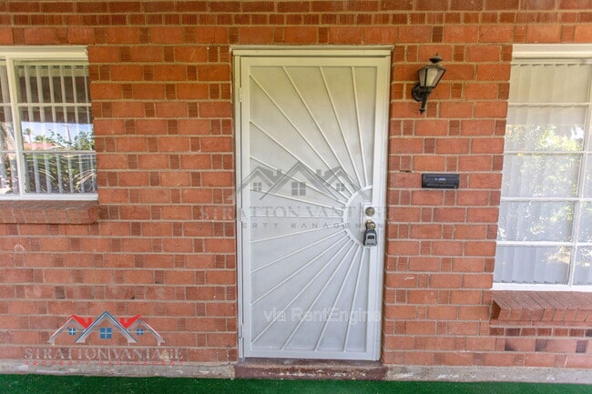 Building Photo - 8119 E Amelia Ave