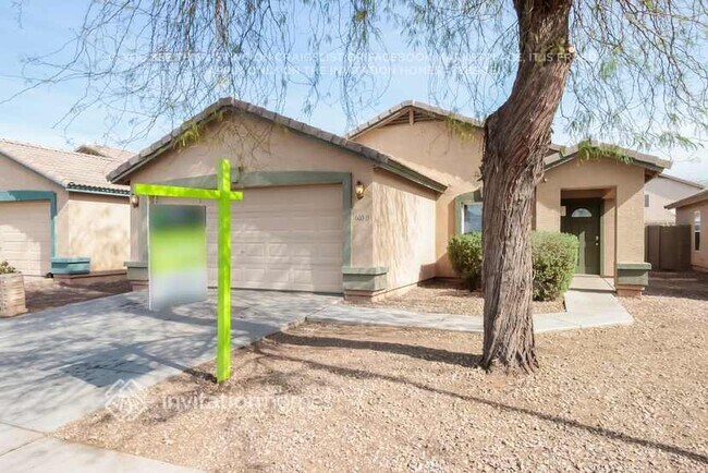 Building Photo - 6050 W Pueblo Ave