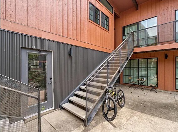 stairs to second floor unit - 400 E 30th St