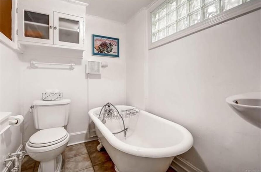 bathroom with vintage clawfoot tub - 726 East 16th Avenue