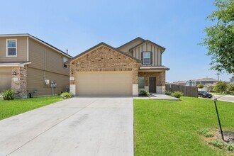 Building Photo - Spacious 4-Bed Oasis with Community Pool, Island Kitchen & Fenced Yard in San Antonio