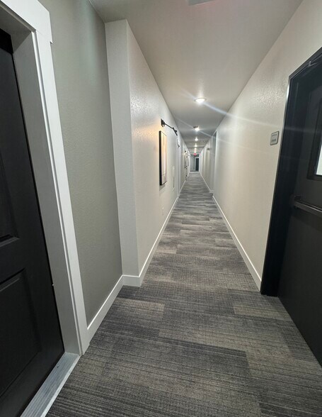 Hallway to elevator/stairs from Unit - 265 High Point Dr