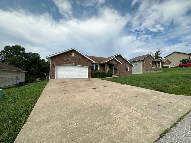 Building Photo - Your Dream Rental Awaits in Osage Hills – ...