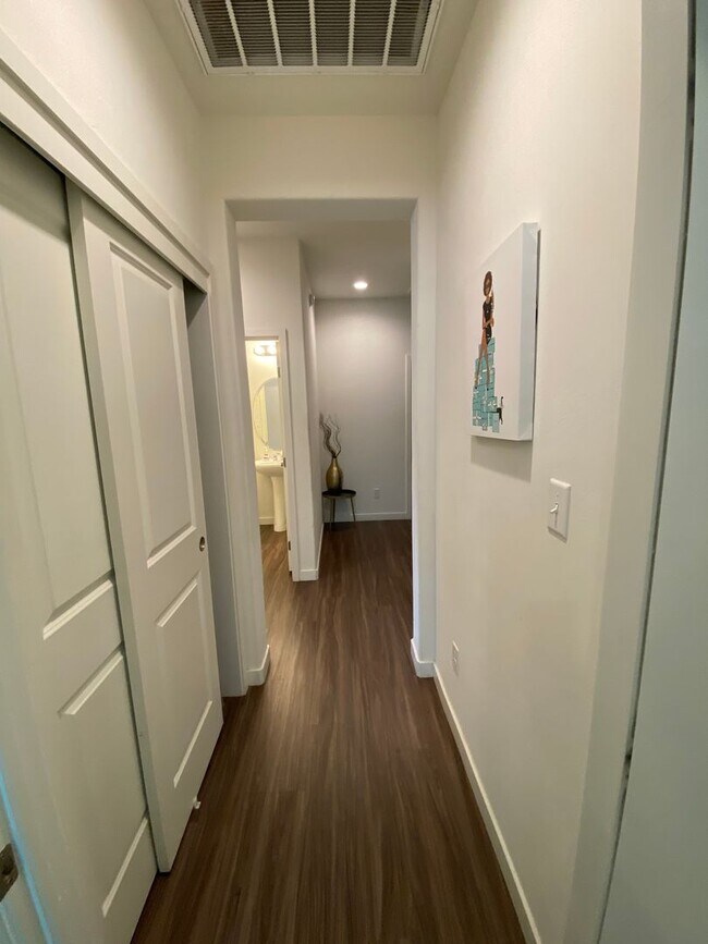 Building Photo - Welcome to the Best Deal in Town. Fully furnished 4 BD 2 BA house on a corner lot