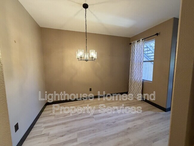 Building Photo - 8000 W Badura Ave
