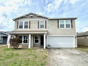 Building Photo - Move In Ready!-Charming 3 -bedroom Home with a move in special-$300 off first month's rent.