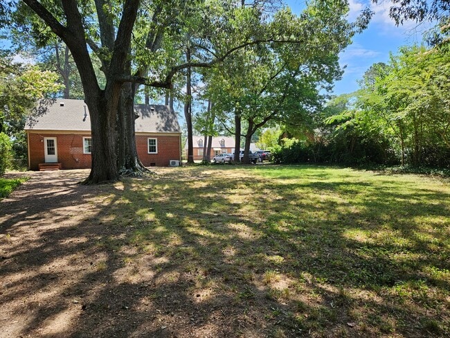 Building Photo - First Offering - 4BR/2BA Brick Cape Cod - ...