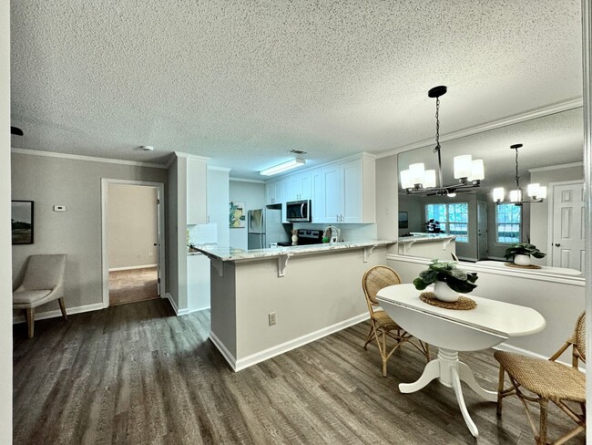 Building Photo - REDUCED PRICE! Updated 1st Floor/1-Level Condo Ready NOW! Includes Water, Sewer, Trash, Landscapi...