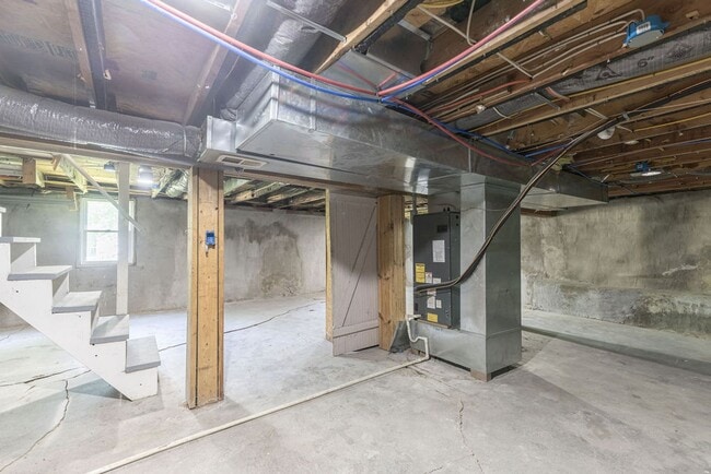 Building Photo - Remodeled 2-Bedroom Bungalow with Spacious Yard & 1-Car Basement Garage