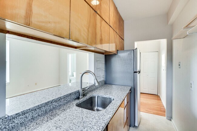 Building Photo - Top Tier Two-Level Abode-- Storage and Parking Included!