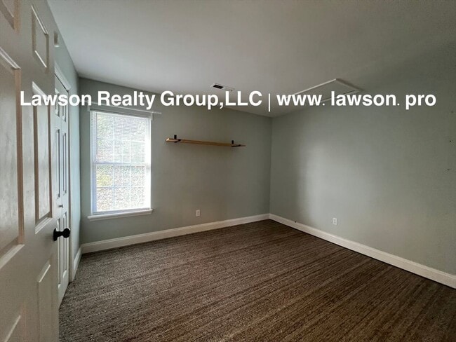 Building Photo - Adorable and Updated-One Level Living with Paved Driveway