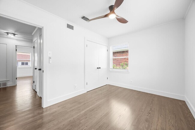 Building Photo - **$40K+ IN UPGRADES AND A FENCED BACKYARD WITH TWO STORAGE BUILDINGS**