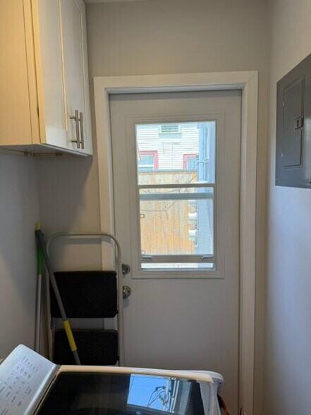 Laundry room access door to backyard - 713 S Columbus Ave