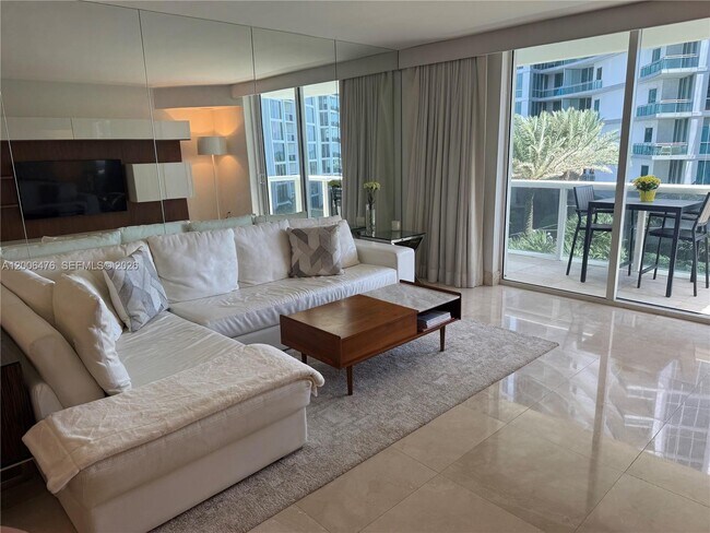 Building Photo - 10275 Collins Ave