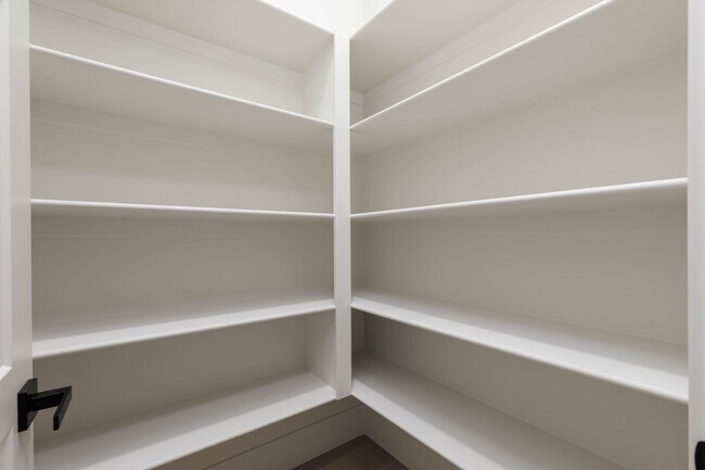 Building Photo - Gorgeous Custom Single Story with RV Garage