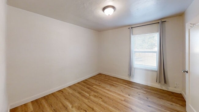 Building Photo - Fresh 3BR/2BA • Pet Friendly • Garage • Mo...