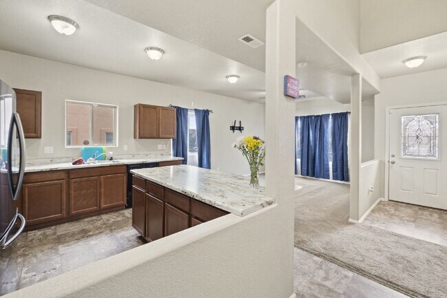 Building Photo - "Beautiful Townhome 3-Bedroom  2.5 Baths no carpet home, just 7 minutes from Fort Carson!"