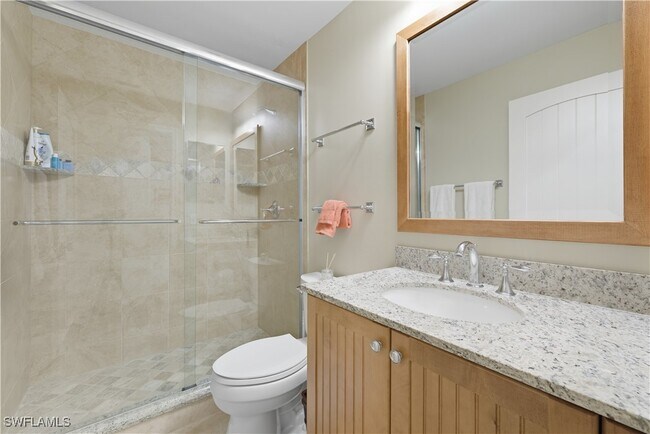 Building Photo - 7040 Pelican Bay Blvd