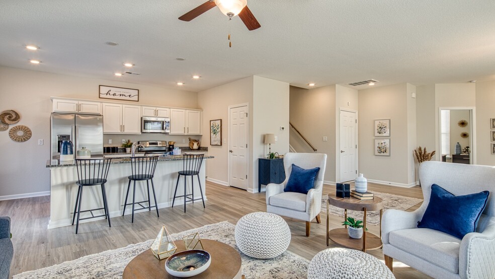 A living room you won't want to leave - Hillpoint Preserve Townhome Apartments