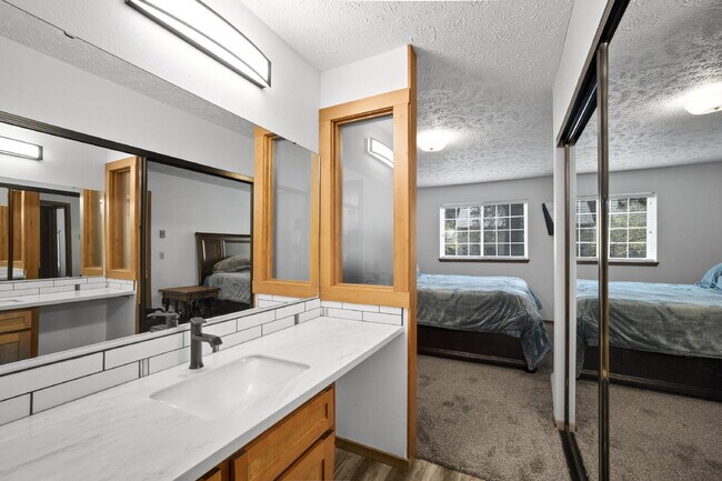 Building Photo - The epitome of carefree condo life is righ...