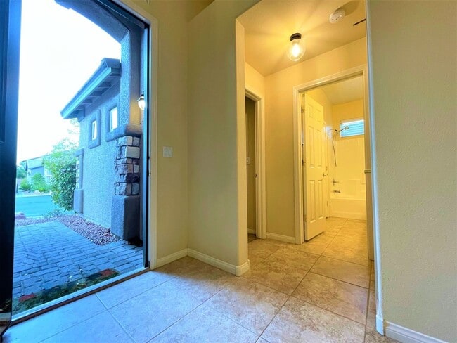 Building Photo - Vaulted Ceiling single-story home in a gat...