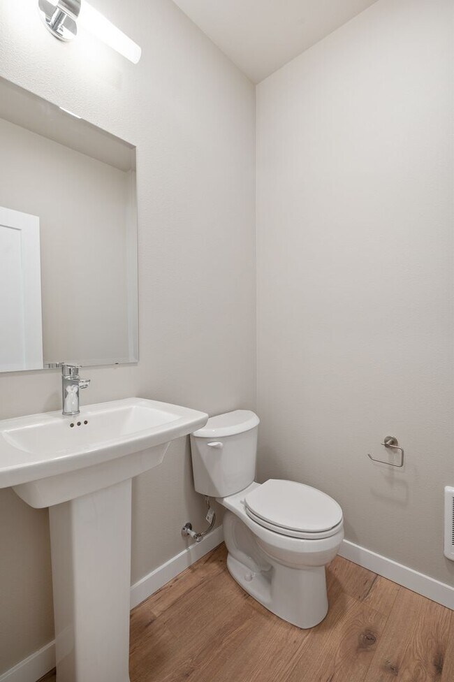 Building Photo - NEW CONSTRUCTION – Stylish 4-Bedroom Townh...