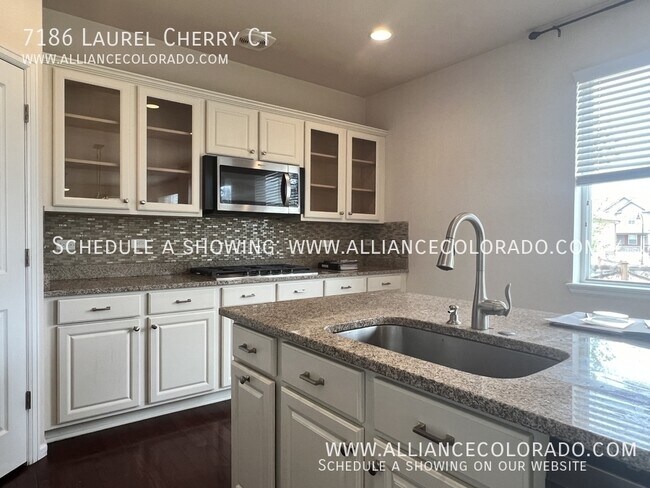 Building Photo - 7186 Laurel Cherry Ct