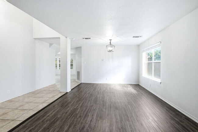 Building Photo - 4 Bedroom home with ZERO carpet close to RAFB