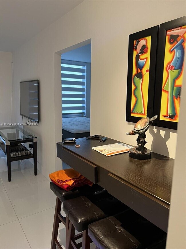 Building Photo - 5555 Collins Ave