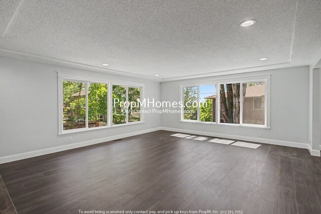Building Photo - Freshly Renovated Four Bedroom Home in Bull Mountain!