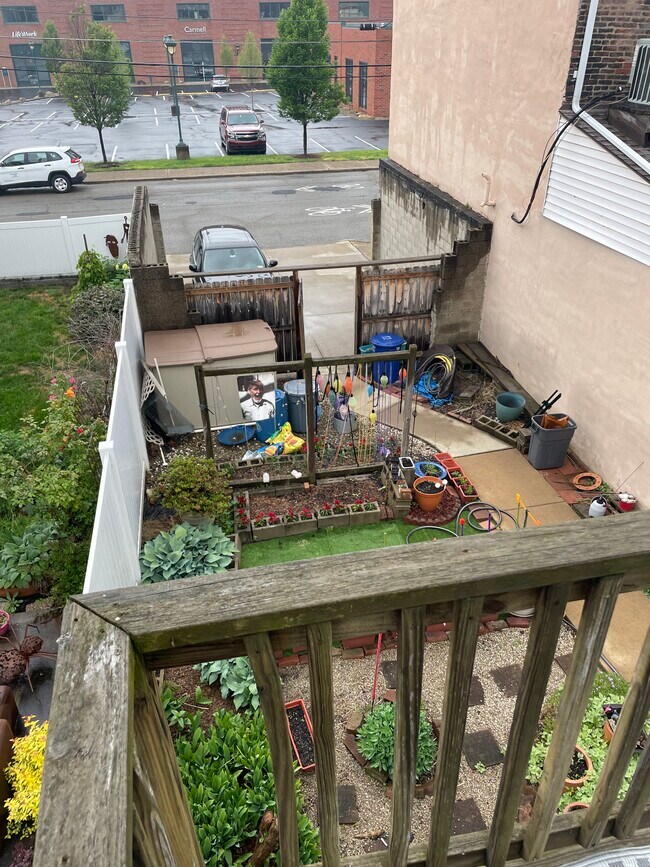 view of garden & parking pad from main level deck - 2415 Wrights Way