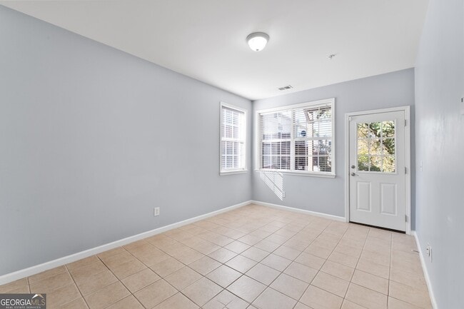 Building Photo - 4674 Creekside Villas Way