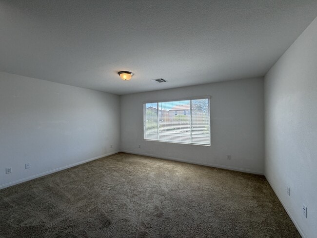 Building Photo - 7869 Tyrell Peaks St