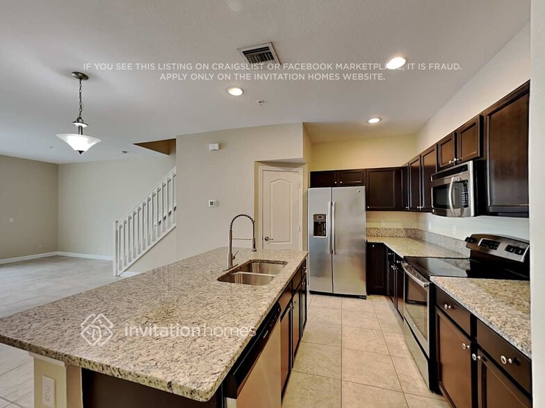 Building Photo - 9495 SW Merlin Ct