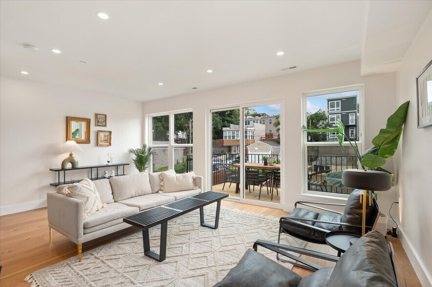 Living room opens up to back balcony - 318 Webster St NW