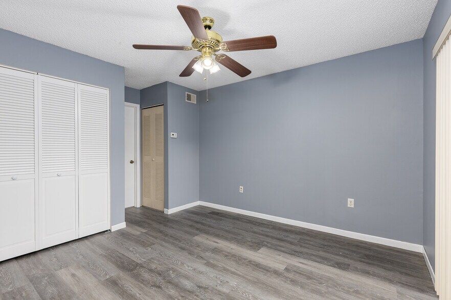 1st floor primary with full closet walkout sliding glass door to patio - 2636 Crown Ct