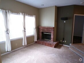 Building Photo - Charming 1 Bed, 1 Bath Main-Floor Condo in...