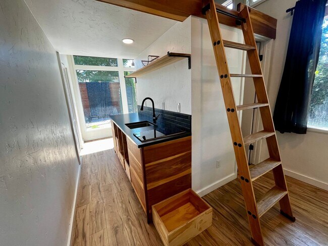 Building Photo - Modern Private Studio with Loft, Patio & Off-Street Parking