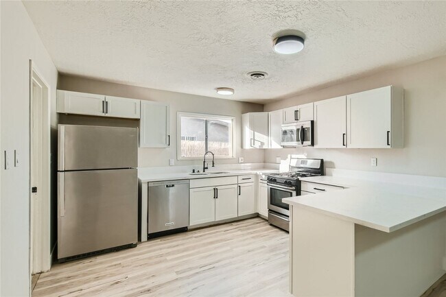 Building Photo - STUNNINGLY REMODELED Single Story Home wit...