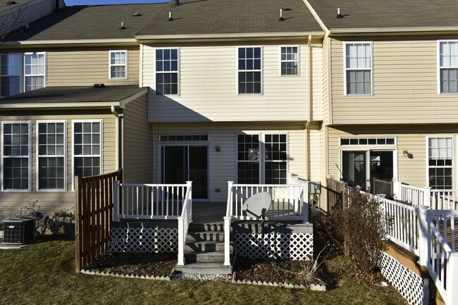 Building Photo - Spacious 3-Story Townhouse with One-Car Garage