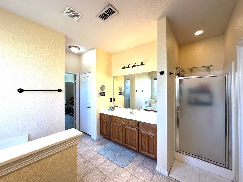 Large master bath with shower and soaking tub - 1165 Albatross Ct
