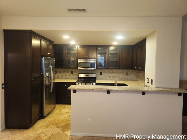 Building Photo - Modern 2-Bedroom Condo Near Victoria Gardens