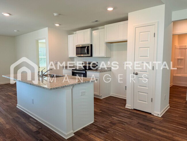 Building Photo - HALF OFF DEPOSIT SPECIAL!! New Constructio...