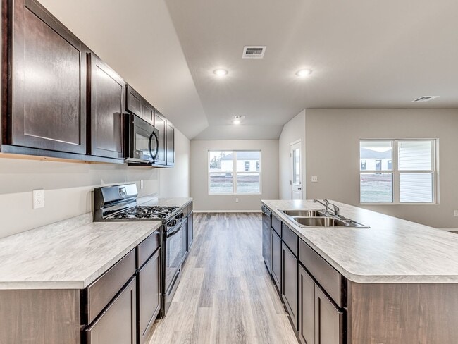 Building Photo - Brand New Construction + 4 bedrooms + Must...