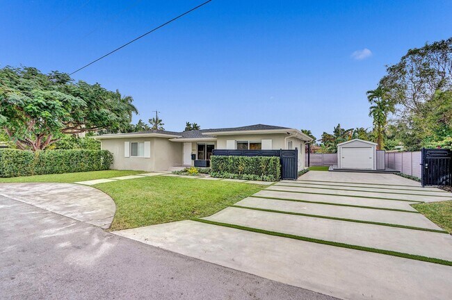 Shed has A/C and flooring. Makes a great office or extra storage. - 11425 NE 3rd Ave