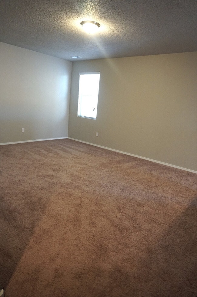 Building Photo - Spacious 4 bedroom Rio Rancho home in Enchanted Hills! Refrigerated air. Right off 550