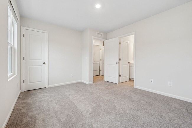 Building Photo - Available Now! New Construction - 3 Bedroo...