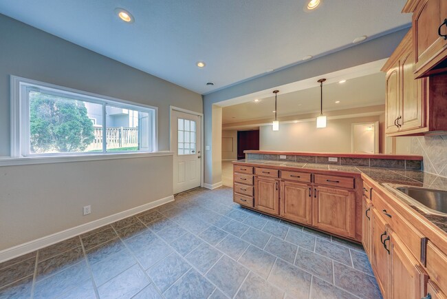 Building Photo - {14400} Somerset Brooke + Beautifully Updated Throughout + Finished Walk Out Basement + Fenced Yard