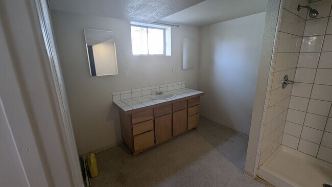 Building Photo - Spacious Three Bedroom with Large Backyard...